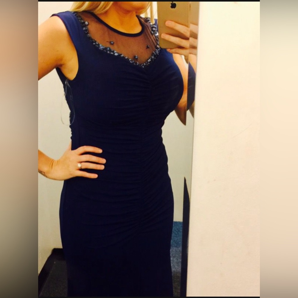 Navy Blue, mesh neck and back. 
scrunchy side/back. Worn once, great condition